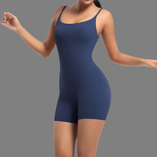 Sporty yoga bodysuit in navy. Made from organic cotton. Features a relaxed fit and breathable material.