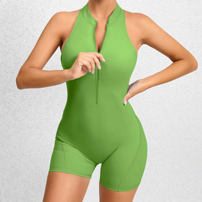 Green zippered fitness romper in organic cotton. Offers a relaxed fit and breathable material for workouts.