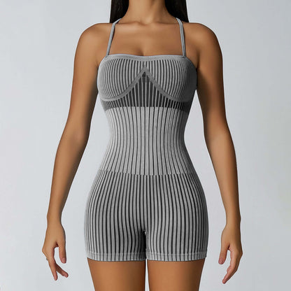 Ribbed strappy bodysuit in organic cotton. Relaxed fit and breathable material.