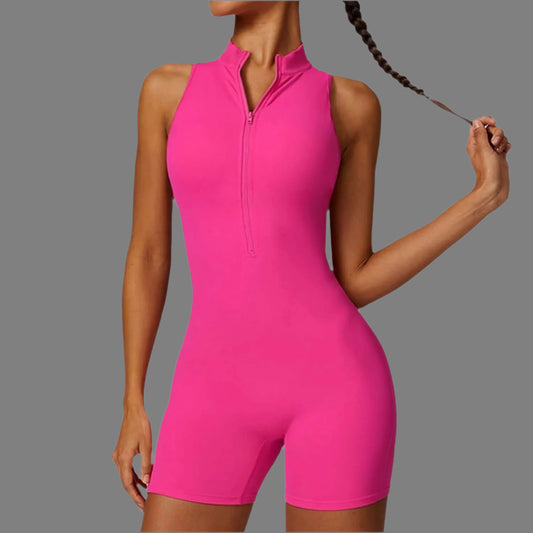 Pink yoga jumpsuit made of organic cotton. Relaxed fit with breathable material. Ideal for back support and comfort.