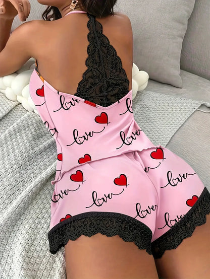 Lace back sleepwear set in pink with heart prints. Made from organic cotton. Features a relaxed fit and breathable material.