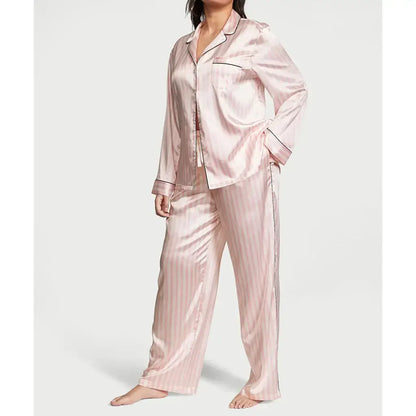 2Pcs satin pajamas in organic cotton. Relaxed fit for comfort. Breathable material perfect for sleep and lounging.