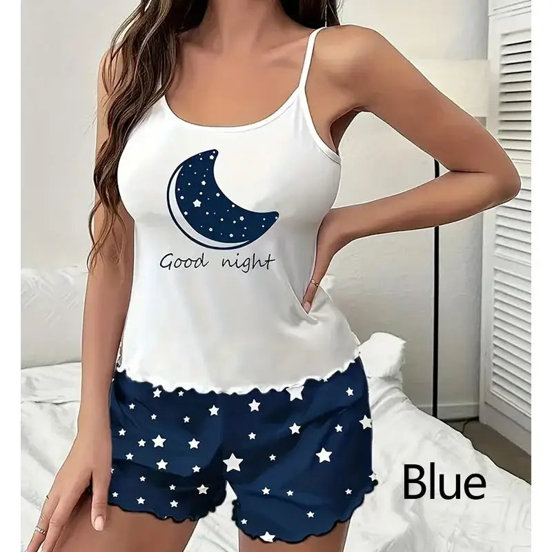 Women's blue star print sleepwear set in organic cotton. Features relaxed fit and breathable material. Perfect for a good night's sleep.