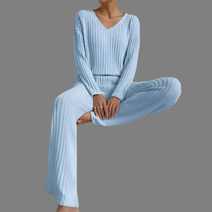 Soft knitted lounge set pajamas in light blue. Made of organic cotton. Features a relaxed fit and breathable material.