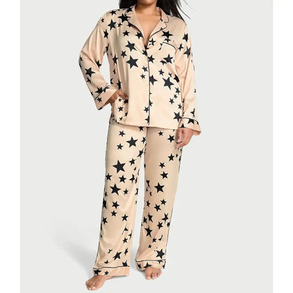 Women's satin pajamas with star print, made from organic cotton. Relaxed fit and breathable material for comfort.