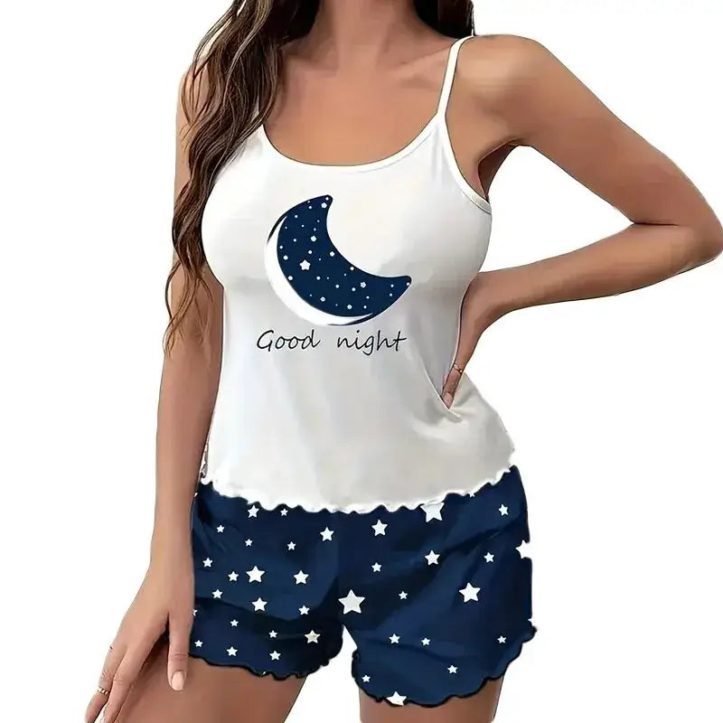 Relaxed fit sleepwear set in organic cotton. Breathable material with moon and star design. Perfect for cozy nights.