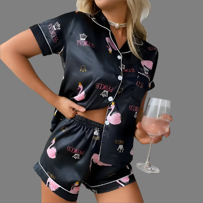 Alt Tag: Woman in a heart print casual set made from organic cotton. Relaxed fit and breathable material. Ideal for comfort.