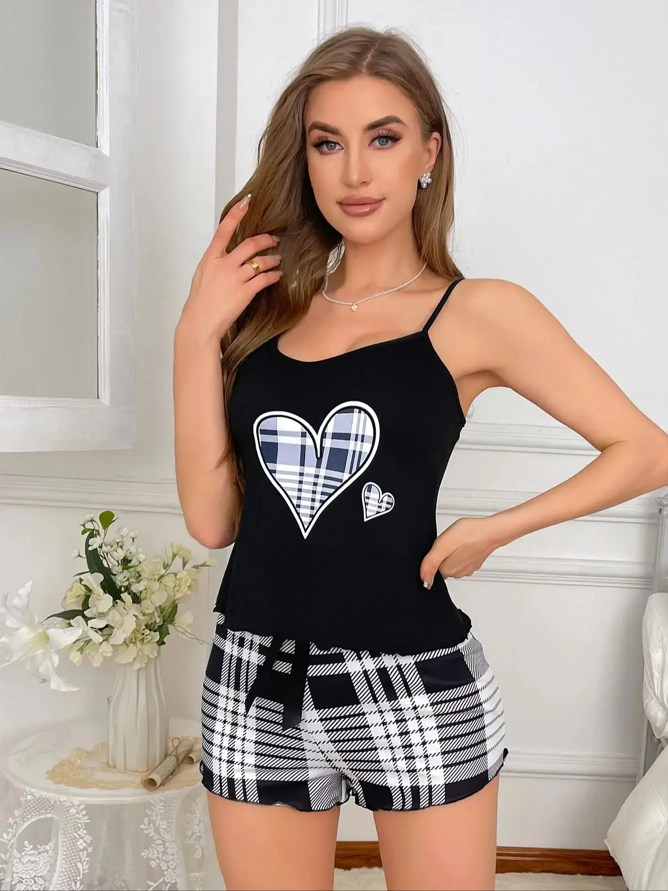 Woman wearing a Plaid Heart Set, made from organic cotton. Features a relaxed fit and breathable material for comfort.