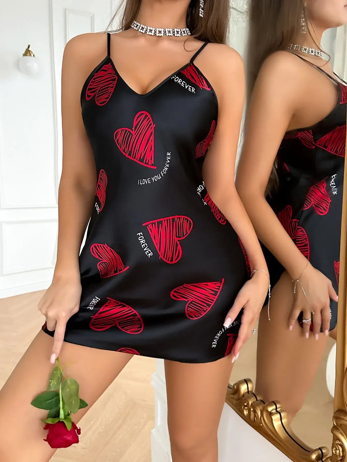 Red lip print satin slip with organic cotton. Features relaxed fit. Breathable material for comfort.