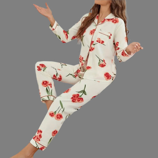 Alt Tag: Organic cotton long sleeve top and pants. Features relaxed fit and breathable material. Floral pattern with red flowers.